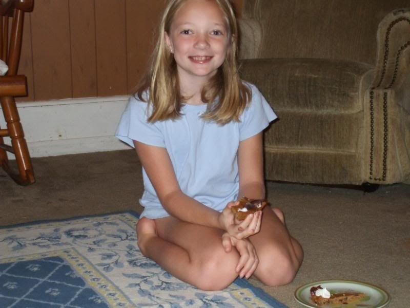 Madeline eating birthday cookie