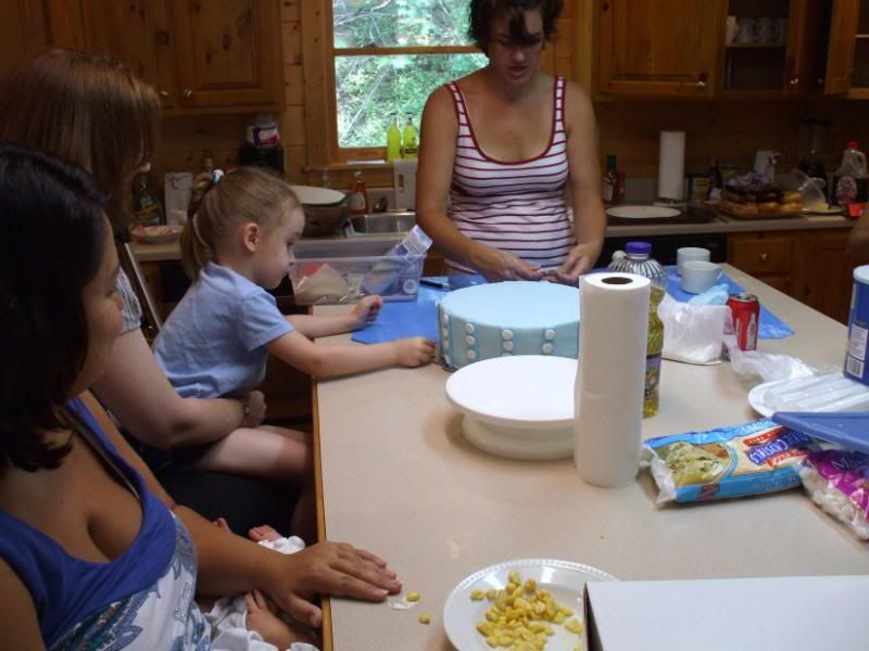 Watching the cake making.