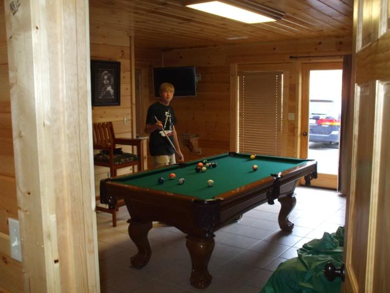 Daniel playing pool in Cabin 2