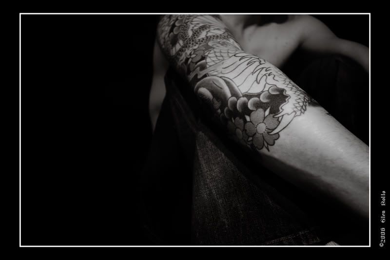 IMAGE: http://i37.photobucket.com/albums/e56/GCR22/Photography/Posting/Tattoo_004Sm.jpg