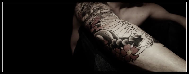 IMAGE: http://i37.photobucket.com/albums/e56/GCR22/Photography/Posting/Tattoo_004cSm.jpg