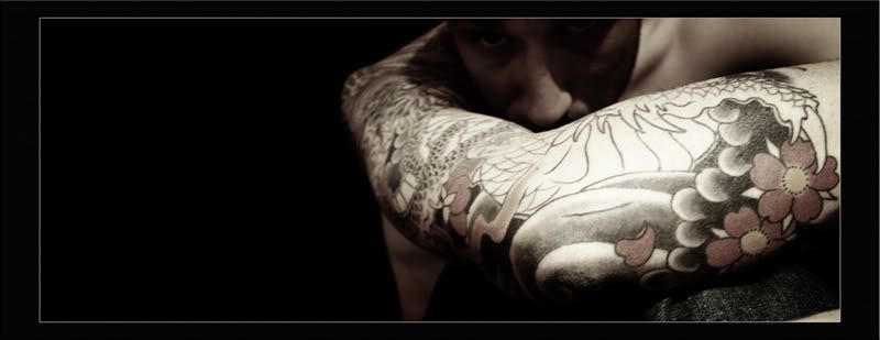IMAGE: http://i37.photobucket.com/albums/e56/GCR22/Photography/Posting/Tattoo_005Sm.jpg