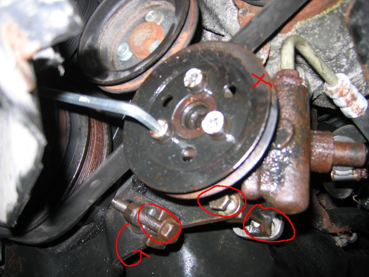 tightening the power steering belt