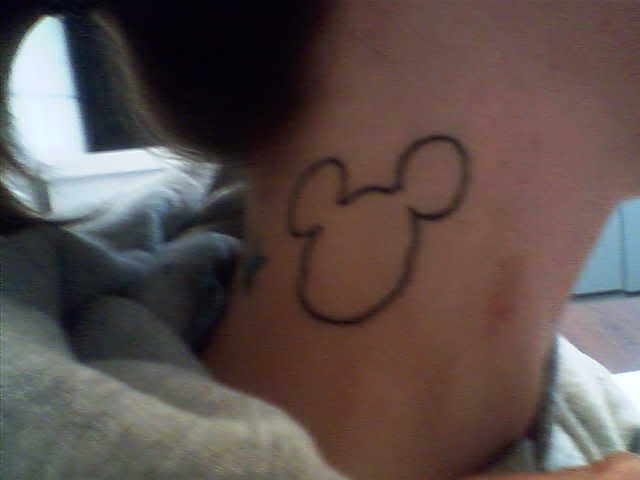 My mickey tattoo on my neck. need to fix it .