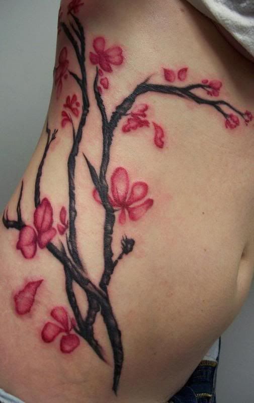 tree tattoos on side. girlfriend cherry tree tattoos