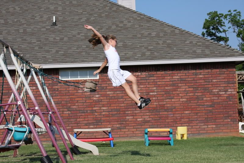 IMAGE: http://i37.photobucket.com/albums/e95/caddoalan/SWING.jpg